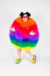 Ashley Longshore in a rainbow ball dress